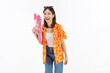 © sitthiphong - Songkran festival in Thailand, Cheerful young woman wearing summer wearing floral shirt with a pink toy gun isolated on white background.