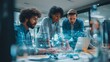 © Wall Art Galerie - Team collaborating on digital project with laptop and data overlay, business technology and innovation concept for startup strategy and teamwork
