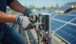 © Pete - Technician connects wires to solar panel system on rooftop. Hands in gloves attach cables to inverter device. Renewable energy installation outdoors. Green power generation.