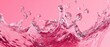 © Sitti - Dynamic Pink Liquid Splash with Bubbles and Droplets.