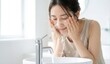 © saku - 洗顔をしている若い日本人女性
