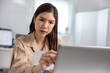 © 220 Selfmade studio - Asian woman office computer laptop document paperwork focus concentration work professional
