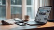 © Dao - Watching news online on laptop with mobile newspaper technology