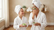 © Frendev - Mother and child wear bathrobes and hold cucumber slices during a playful skincare routine designed around gentle care for sensitive skin