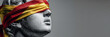 © VicenSanh - Stone face wrapped in red and yellow cloth. Statue shows serene, unblinking gaze. Blindfold symbolizes impartial judgment. Ideal for legal, ethics, or fairness themes