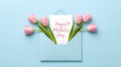 © Gambar - Pink Tulips in Light Blue Envelope for Mother's Day Greeting Card on Sky Blue Background