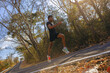© Panumas - Silhouette of young man running sprinting on road. Fit runner fitness runner during outdoor workout with sunset background