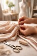 © Marina Dubin - Hands gathering satin fabric in atelier setting, illustrating garment construction, bespoke tailoring and elegant fashion design process