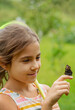 © yanadjan - The child catches butterflies in nature. Selective focus. ,