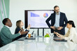 © Dejan - Diverse business team having a tense meeting, discussing market analysis and sales strategy after reviewing a declining performance report