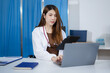 © NINENII - Medical students working with tablets and hospital documents
