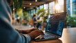 © Людмила Лазебная - Close up of hands on a laptop showing a web application development environment with a live preview panel beside the code editor a browser developer tools console open at the