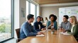 © Marcelino Victor M - Diverse Business Team Discussing Wellbeing in Modern Office