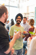 © Rawpixel.com - Casual gathering with diverse individuals.
