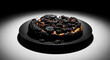 © Firyal Affina - Completely Burnt Cake on Black Plate Under Spotlight, Illustrating a Cooking Disaster