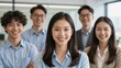© Studicon - Diverse group of young professionals poses for a company portrait in a modern office