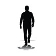 © Maa Stock - Silhouette of a person walking away from the camera on a flat surface
