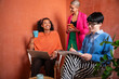 © ADDICTIVE STOCK - Creative women collaborating in relaxed business setting