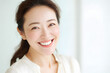 © Amber - 自然で健康的な白い歯の日本人女性（審美歯科・エイジングケア）｜Mature Japanese woman with natural white teeth, dental care concept