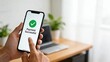 © Aspect - Mobile payment successful on smartphone screen hand holding device with green checkmark icon online shopping confirmation digital transaction complete modern business technology