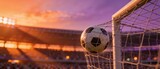 Soccer Ball in Goal Net at Sunset Stadium