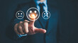 © AnupKumar - Businessman pointing at happy face icon for customer satisfaction survey.