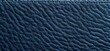 © Jaaabz - Deep Blue Textured Leather Background with Subtle Grain Detail.
