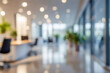© Saichol - Blurred background of modern office with window and city skyline