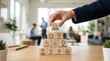 © Pinit - Boosting leadership capabilities through soft skills training, featuring wooden blocks with icons for teamwork, communication, empathy, and emotional intelligence at work.