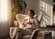 © Vico - Relaxed woman in cozy pajamas drinking coffee in bright morning light