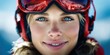 © NovaVision - Close-up portrait of a happy woman with blue eyes wearing ski goggles and helmet