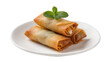 © Miguel - Golden spring rolls on white plate garnished with fresh mint leaves