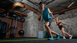 © master1305 - Man and woman performing dynamic shuttle run exercise together in modern gym. Concept of partner training, fitness program engagement, active lifestyle and teamwork workout
