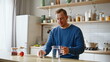 © stockbusters - Healthy man pouring water transparent glass sitting kitchen countertop closeup.