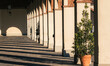 © ADDICTIVE STOCK - Sunlit colonnade in Piamonte, Italy morning scene