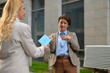 © Dexon Dee - Businesswoman receiving letter expressing gratitude and appreciation