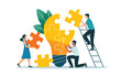 © fatimatz - Team members meticulously assemble a giant lightbulb from puzzle pieces, symbolizing problem solving