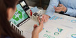 © Natee Meepian - Discussing ESG and sustainable energy solutions