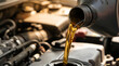 © Stock iT - Motor oil pouring into car engine for vehicle maintenance and professional auto repair service concept.