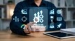 © CuteBee - A person interacts with a virtual display showing 'PROCESS IMPROVEMENT' surrounded by icons representing growth, efficiency, and various business metrics.