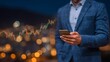 © kado - Businessman holding phone with stock market graph.