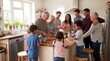 © Topa - A diverse family gathers around the kitchen island preparing and enjoying a meal together indoors.