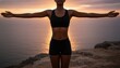 © QuoDesign - A young woman standing on a rugged coastal cliff at sunset with her arms outstretched in a gesture of complete freedom and joy