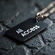 © Oleksandr - Black metal tag displays All Access text with chain. Item rests on dark textured surface, symbolizing exclusivity and entry to events or restricted areas.