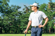 © buritora - A male golfer in golf attire amidst fresh greenery (golf course, academy, membership).