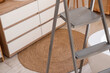 © Pixel-Shot - Metal stepladder in modern bathroom