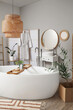 © Pixel-Shot - Interior of bathroom with mirrors, bathtub and folding screen