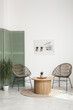 © Pixel-Shot - Interior of living room with pegboard, armchairs and table