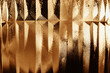 © Westend61 - Abstract close-up of warm textured glass with geometric lines