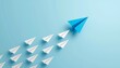© Desmon - Leadership Concept Blue Paper Airplane Leading White Airplanes on Light Blue